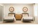 Charming bedroom featuring two beds, stylish decor, and warm natural light at 883 Pilot St # 48, Haw River, NC 27258