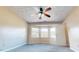 A large bedroom with a ceiling fan and a large bay window for lots of natural sunlight at 96 Overlook Rd, Cameron, NC 28326