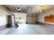 View of garage with open garage door showing street and residential area at 96 Overlook Rd, Cameron, NC 28326