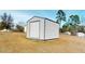 Exterior view of shed in grassy backyard at 96 Overlook Rd, Cameron, NC 28326
