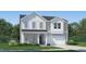 Charming two-story home featuring a gray and white exterior and a manicured green lawn at 0 Hanover Way, Sanford, NC 27330