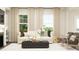 Cozy living room with a stylish sofa, modern decor, and ample natural light from the windows at 0 Hanover Way, Sanford, NC 27330
