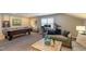 Finished basement featuring a pool table, neutral colored walls and carpet, and a comfortable seating area at 1025 Chelsea Run Ln, Apex, NC 27502