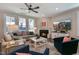 Inviting living room boasts a cozy fireplace, neutral decor, and comfortable seating for relaxing at 1025 Chelsea Run Ln, Apex, NC 27502