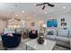 Bright open floor plan with comfortable seating and a seamless transition to the kitchen and dining area at 1025 Chelsea Run Ln, Apex, NC 27502