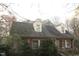 Expansive backyard with mature trees offering privacy and natural beauty at 105 Mary St, Carrboro, NC 27510