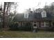 Charming exterior with red shutters and dormer windows at 105 Mary St, Carrboro, NC 27510