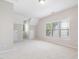 Attic bedroom featuring neutral paint and two bright windows at 1100 Dotson Way, Apex, NC 27523