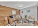 Inviting living room with wood accent wall, contemporary furnishings and plenty of light at 113 Ellen Pl, Chapel Hill, NC 27514