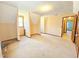 Spacious bedroom featuring cozy carpet, a window, and neutral wall paint at 117 Woodcroft Drive Dr, Angier, NC 27501