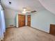 Upstairs bedroom with two closets, blue walls and neutral carpet at 117 Woodcroft Drive Dr, Angier, NC 27501