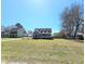 Exterior shot of lovely home in a neighborhood with a well maintained lawn at 117 Woodcroft Drive Dr, Angier, NC 27501