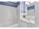 Bathroom featuring tub/shower combo and sink at 1192 Princeton Kenly Rd, Kenly, NC 27542