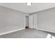 Neutral bedroom featuring closet and doorway leading to another room at 1192 Princeton Kenly Rd, Kenly, NC 27542