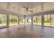 Sunroom featuring door and many windows overlooking backyard at 1192 Princeton Kenly Rd, Kenly, NC 27542