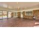Sunroom with brick floor with many windows at 1192 Princeton Kenly Rd, Kenly, NC 27542