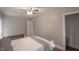 Comfortable bedroom with ceiling fan, neutral color palette, and hardwood flooring, creating a relaxing atmosphere at 1301 Clarendon St, Durham, NC 27705