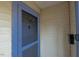 Detailed view of a light blue screen door at the house entrance at 1301 Clarendon St, Durham, NC 27705