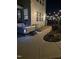 Outdoor hot tub and patio with stylish lighting for evening relaxation at 1516 Barn Door Dr, Apex, NC 27502