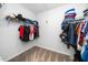 This closet features wire shelving and ample space for hanging clothes and storing belongings at 1516 Barn Door Dr, Apex, NC 27502