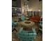 Backyard fire pit area, featuring seating and string lights, great for nighttime gatherings at 1516 Barn Door Dr, Apex, NC 27502