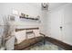 Stylish foyer featuring a decorative bench and elegant wall accents at 1516 Barn Door Dr, Apex, NC 27502