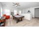Game room featuring a pool table, seating area, and view of the second floor at 1516 Barn Door Dr, Apex, NC 27502
