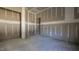 Unfinished bedroom with neutral colored walls and unfinished floors at 1791 Pecan Drive # 22, Nashville, NC 27856