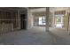 Unfinished spacious living room with large windows and abundant natural light at 1791 Pecan Drive # 22, Nashville, NC 27856