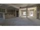 Spacious, unfinished living area featuring large windows for natural light at 1791 Pecan Drive # 22, Nashville, NC 27856