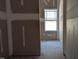 Unfinished room featuring a window and unfinished floors at 1791 Pecan Drive # 22, Nashville, NC 27856