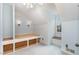 Bedroom with neutral walls, light carpeting, a double window, and built-in shelving at 205 Fox Hollow Dr, Clayton, NC 27527