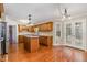 Large kitchen features granite countertops, custom cabinets, and stainless steel appliances at 205 Fox Hollow Dr, Clayton, NC 27527