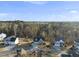 Spacious homes are nestled within a lush landscape of trees and foliage, creating a private, scenic neighborhood at 2244 Plowridge Rd, Fuquay Varina, NC 27526