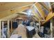 Unfinished attic providing ample storage space and potential for future expansion at 2244 Plowridge Rd, Fuquay Varina, NC 27526