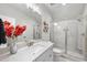Bathroom with a vanity with a sink and a glass enclosed shower at 2244 Plowridge Rd, Fuquay Varina, NC 27526