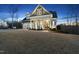 Beautiful two-story home with manicured lawn, two car garage, and inviting front porch with craftsman style columns at 2244 Plowridge Rd, Fuquay Varina, NC 27526