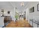 Elegant foyer with hardwood floors and open sightlines to the living spaces at 2244 Plowridge Rd, Fuquay Varina, NC 27526