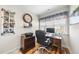 Functional home office space with natural light, a desk, and ample storage at 2244 Plowridge Rd, Fuquay Varina, NC 27526