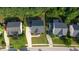 Overhead view of a home with a long driveway and well-manicured lawn at 229 Shillings Chase Dr, Cary, NC 27518