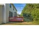 Large wood deck overlooks a lush, well-manicured backyard at 229 Shillings Chase Dr, Cary, NC 27518