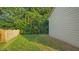 The home has a well-maintained lawn and a partially fenced yard offers privacy at 229 Shillings Chase Dr, Cary, NC 27518