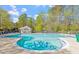 Large community pool with clear blue water, ample seating, and well-maintained surroundings at 229 Shillings Chase Dr, Cary, NC 27518