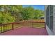 A spacious wood deck with railings provides great outdoor living space at 229 Shillings Chase Dr, Cary, NC 27518