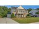 Beautiful brick home with black shutters and landscaped front yard, perfect for families at 229 Shillings Chase Dr, Cary, NC 27518