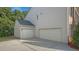 Attached two-car garage and additional one car garage offers ample parking and storage space at 229 Shillings Chase Dr, Cary, NC 27518