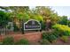 Elegant neighborhood sign for Windermere, surrounded by lush landscaping and a brick base at 229 Shillings Chase Dr, Cary, NC 27518