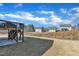 Backyard featuring a deck and view of surrounding neighborhood homes at 240 S Stonehaven Way, Clayton, NC 27527