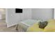 Bedroom featuring neutral walls and carpet, a window, a mounted TV and a doorway at 240 S Stonehaven Way, Clayton, NC 27527