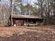 Exterior view of home with a covered porch and one car garage at 2408 Homestead Road Rd, Chapel Hill, NC 27516